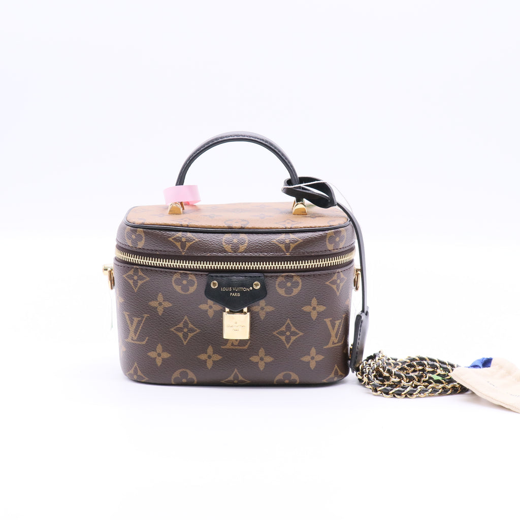 Vanity Handbag Reverse Monogram Canvas PM twins