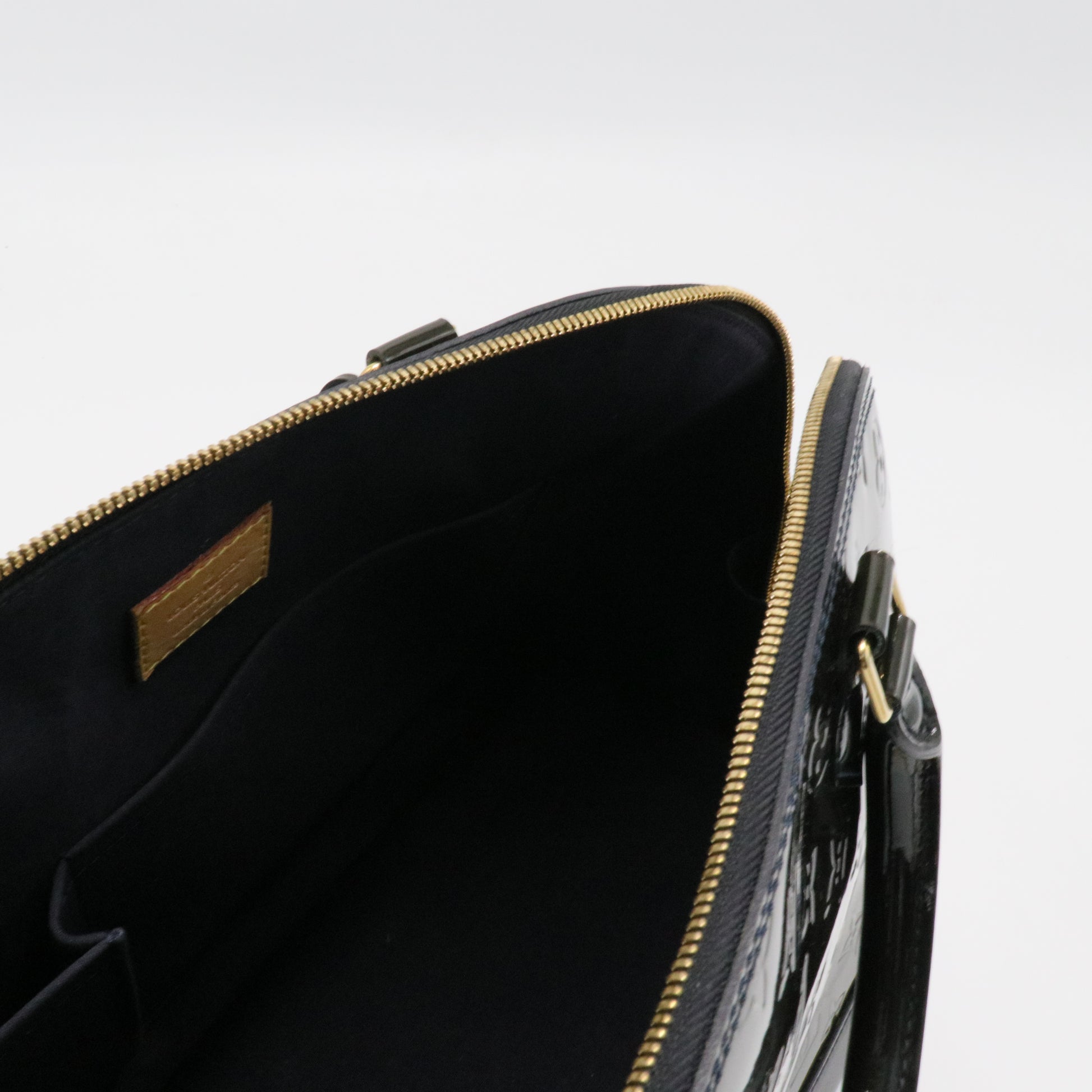 Alma Handbag Monogram Vernis GM