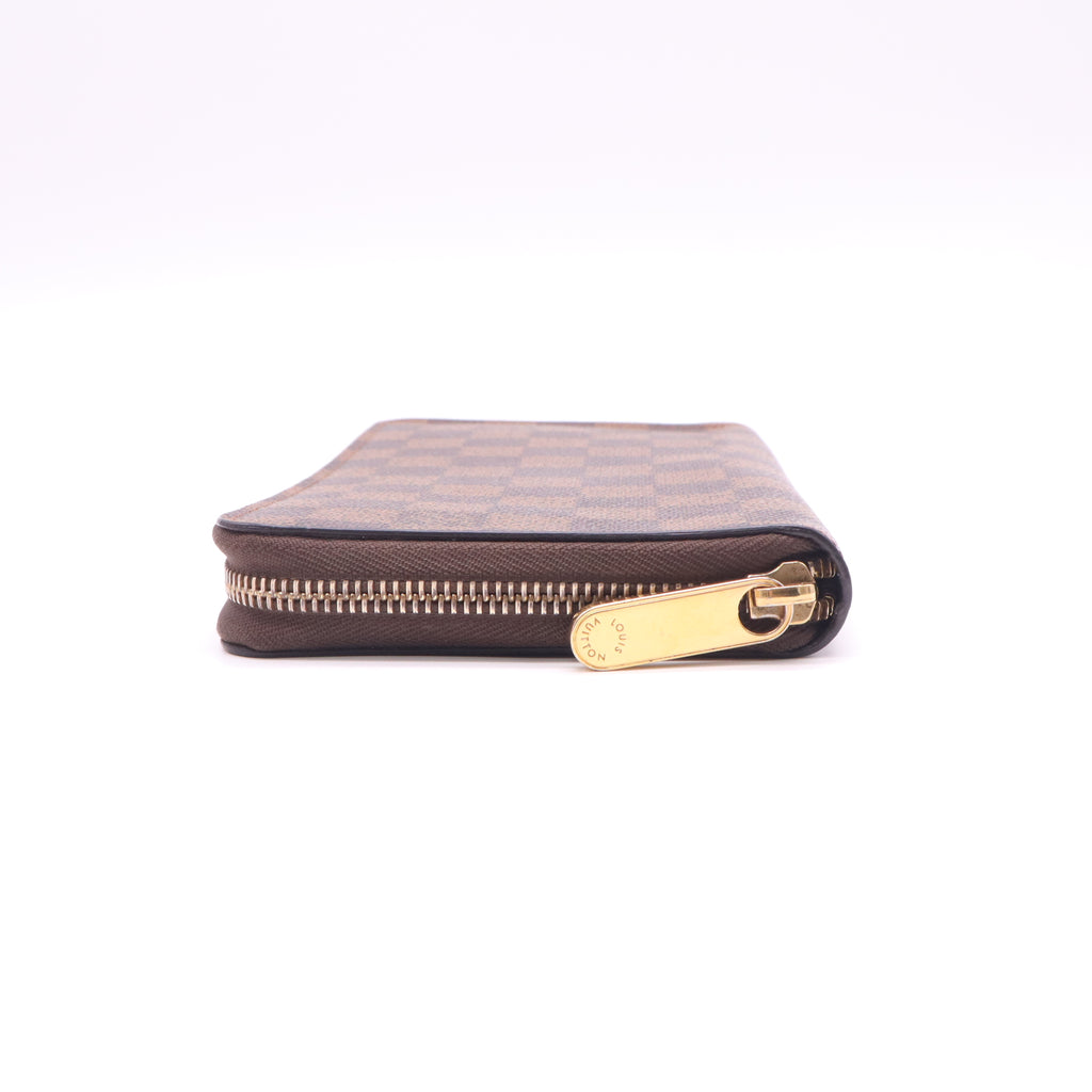Damier Ebene Zippy Wallet Rose Ballerine W22665