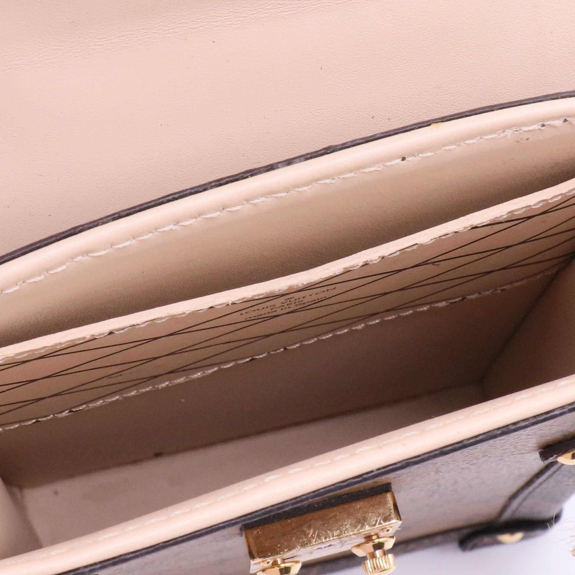 Reverse Monogram Pochette Trunk Twins