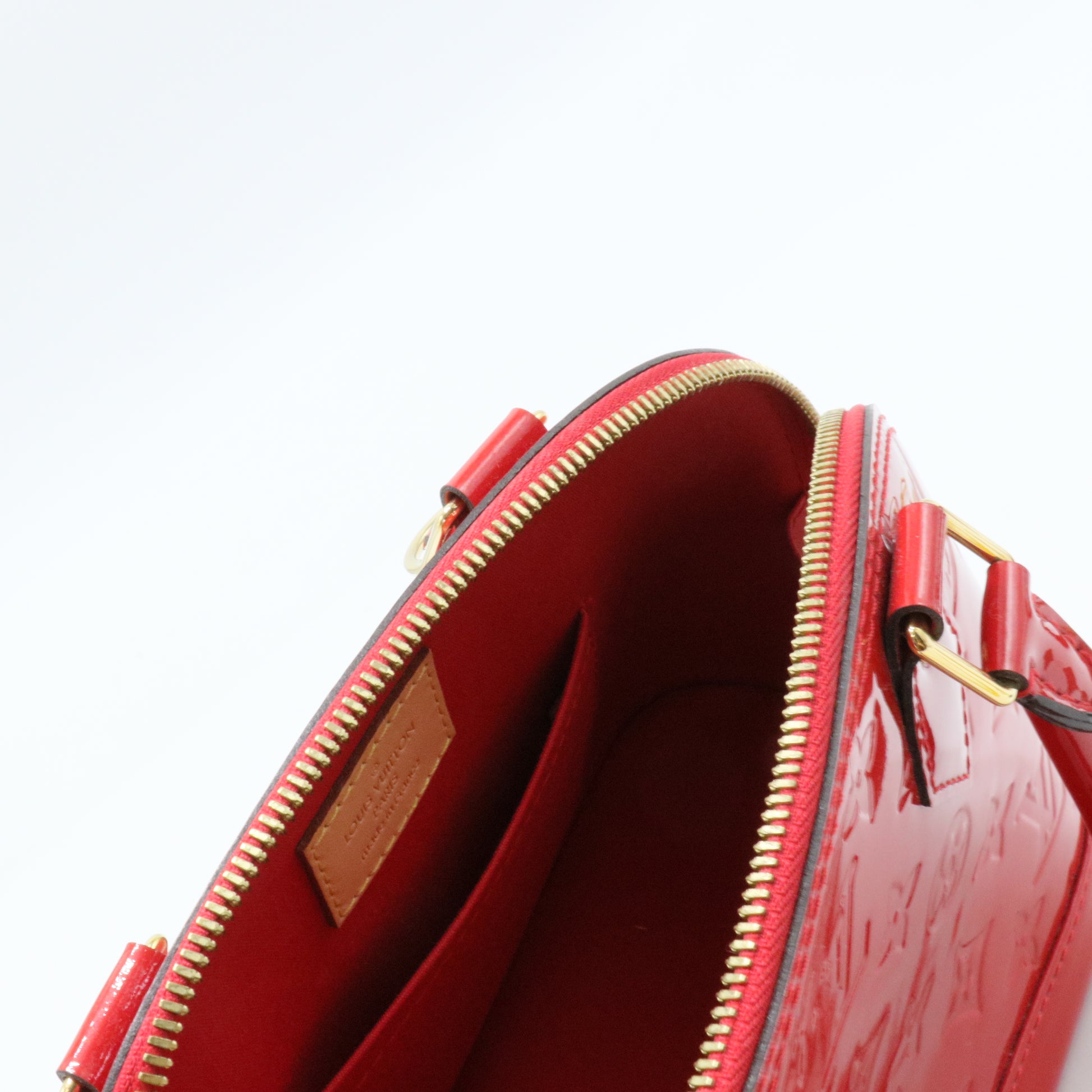 Alma Handbag Monogram Vernis BB