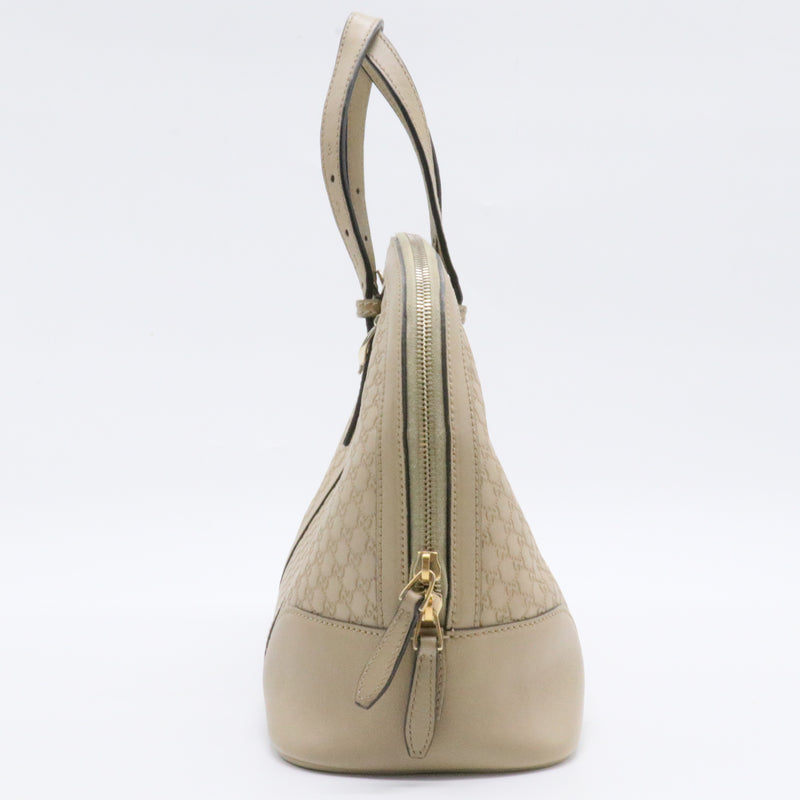 Top Handle Bag Microguccissima Leather Small