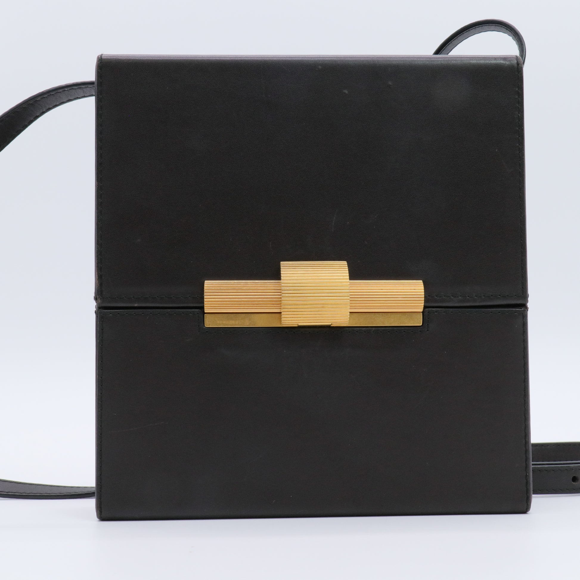 Black leather Daisey box crossbody bag Gold-color brass ribbed clasp For Gisel