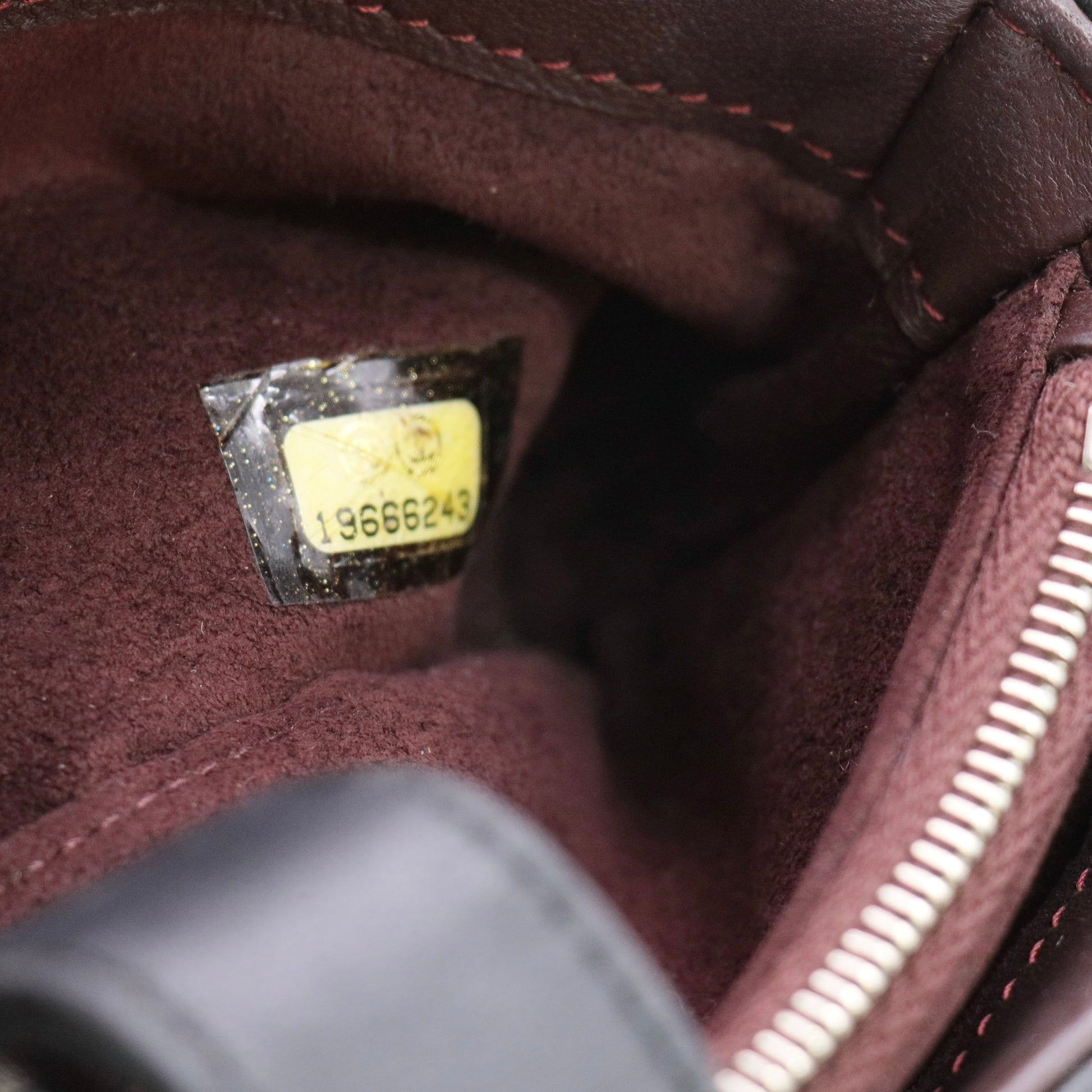 Black lambskin quilted O-Mini clutch twins