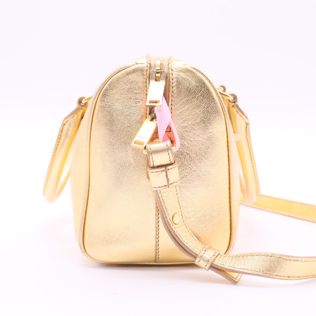 Saint Laurent Metallic Gold Calfskin Leather Classic Baby Duffle Bag twins