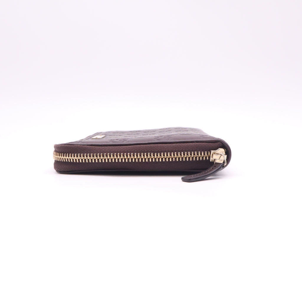 Gucci Guccissima Metal Bar Zip Around Wallet W22657