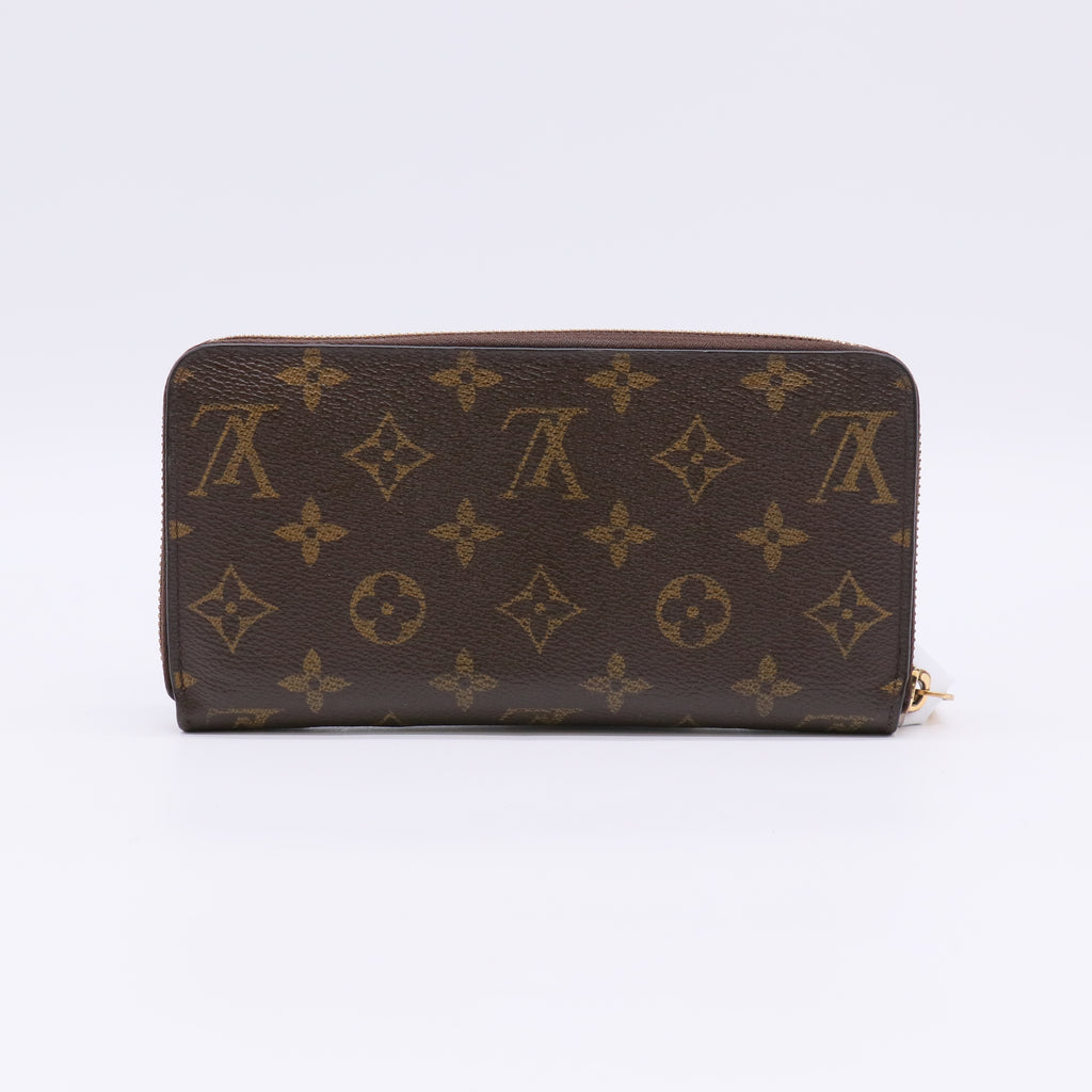 Monogram Zippy Wallet Rose Ballerine W22600