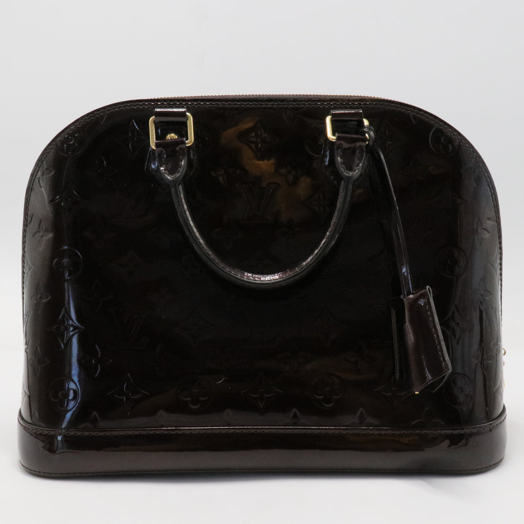 Alma Handbag Monogram Vernis PM