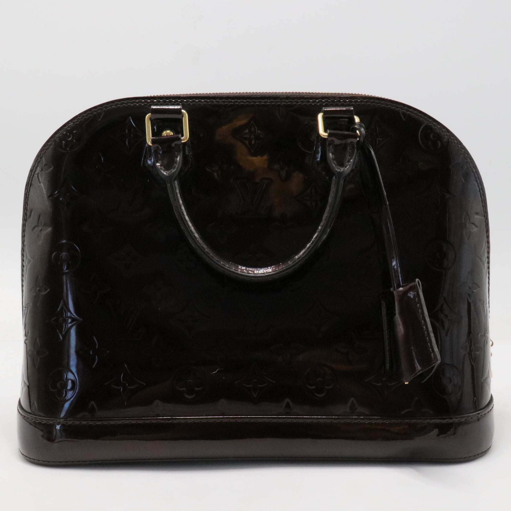Alma Handbag Monogram Vernis PM