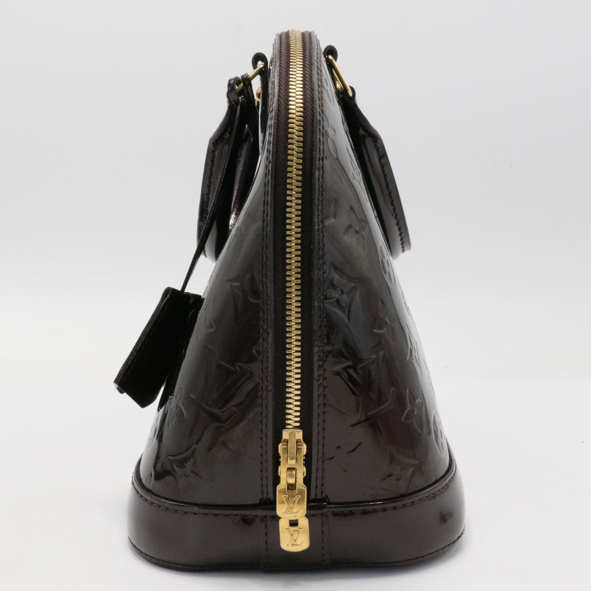 Alma Handbag Monogram Vernis PM