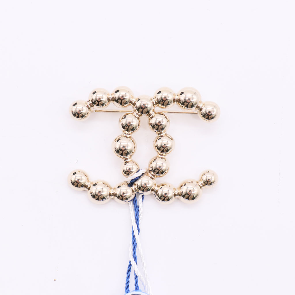 Brand New Light Gold CC Bead Brooch Twins