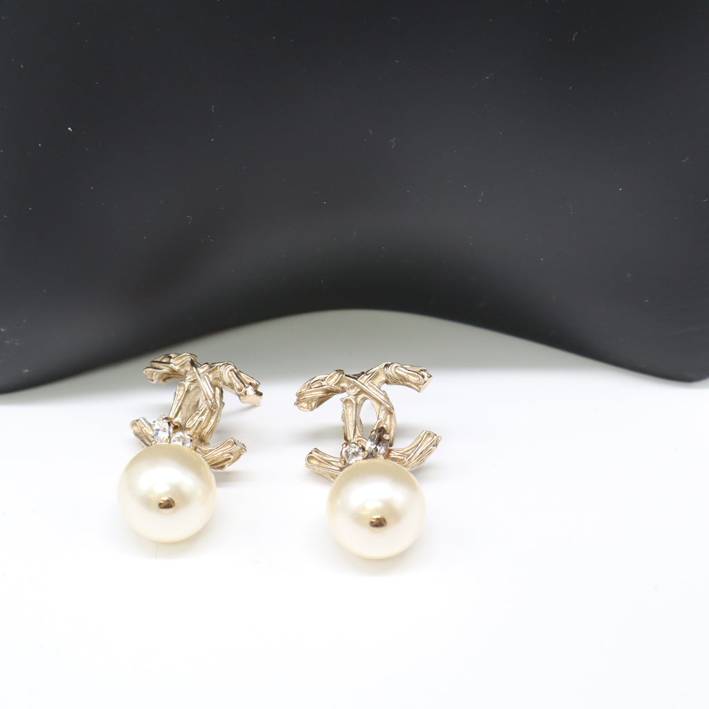 Chanel light gold earrings twins LDJ4169