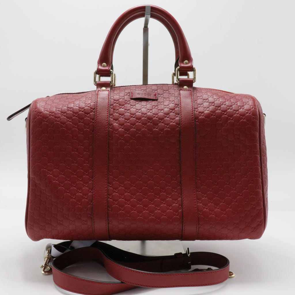 Joy Boston Bag Microguccissima Leather Medium