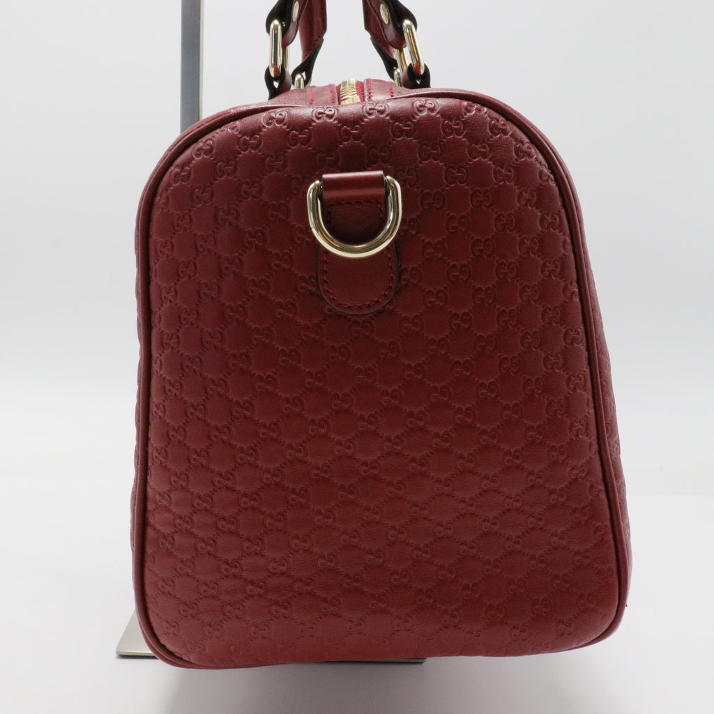 Joy Boston Bag Microguccissima Leather Medium