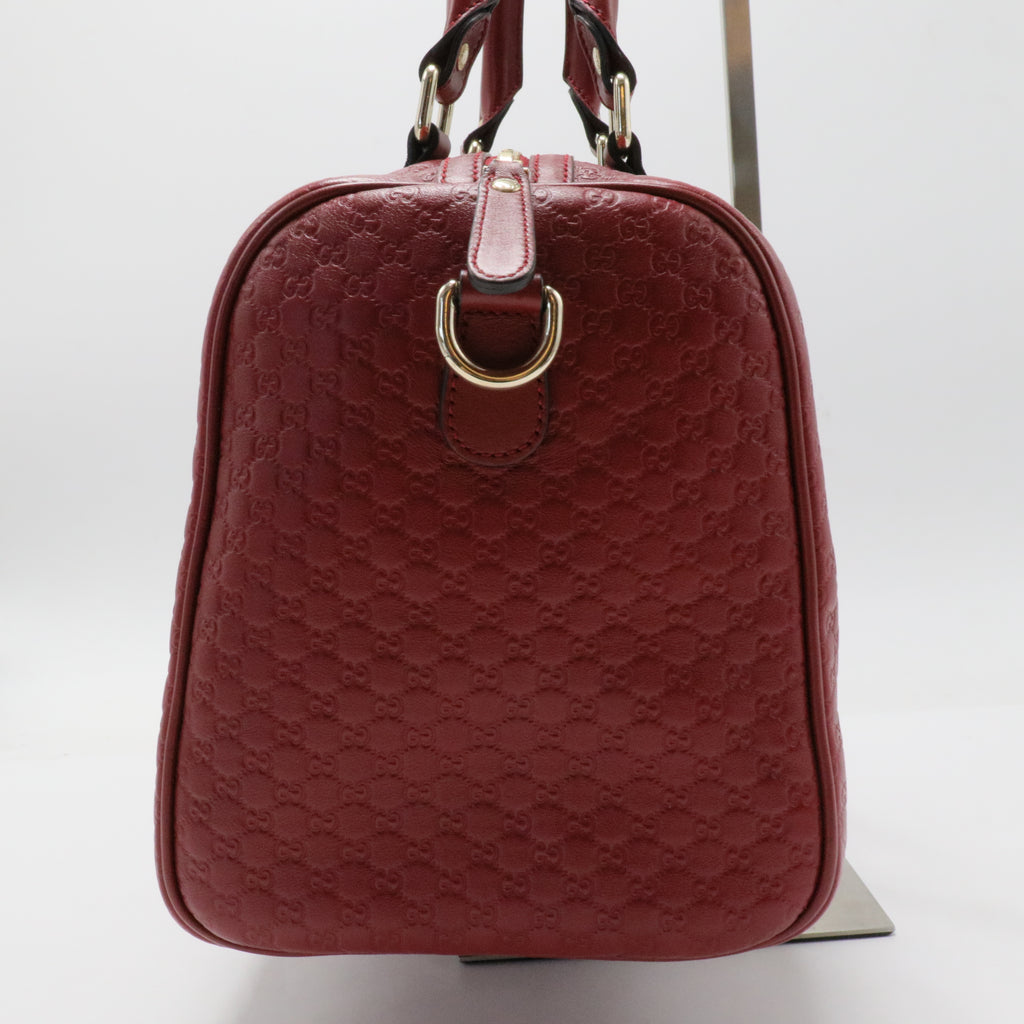 Joy Boston Bag Microguccissima Leather Medium