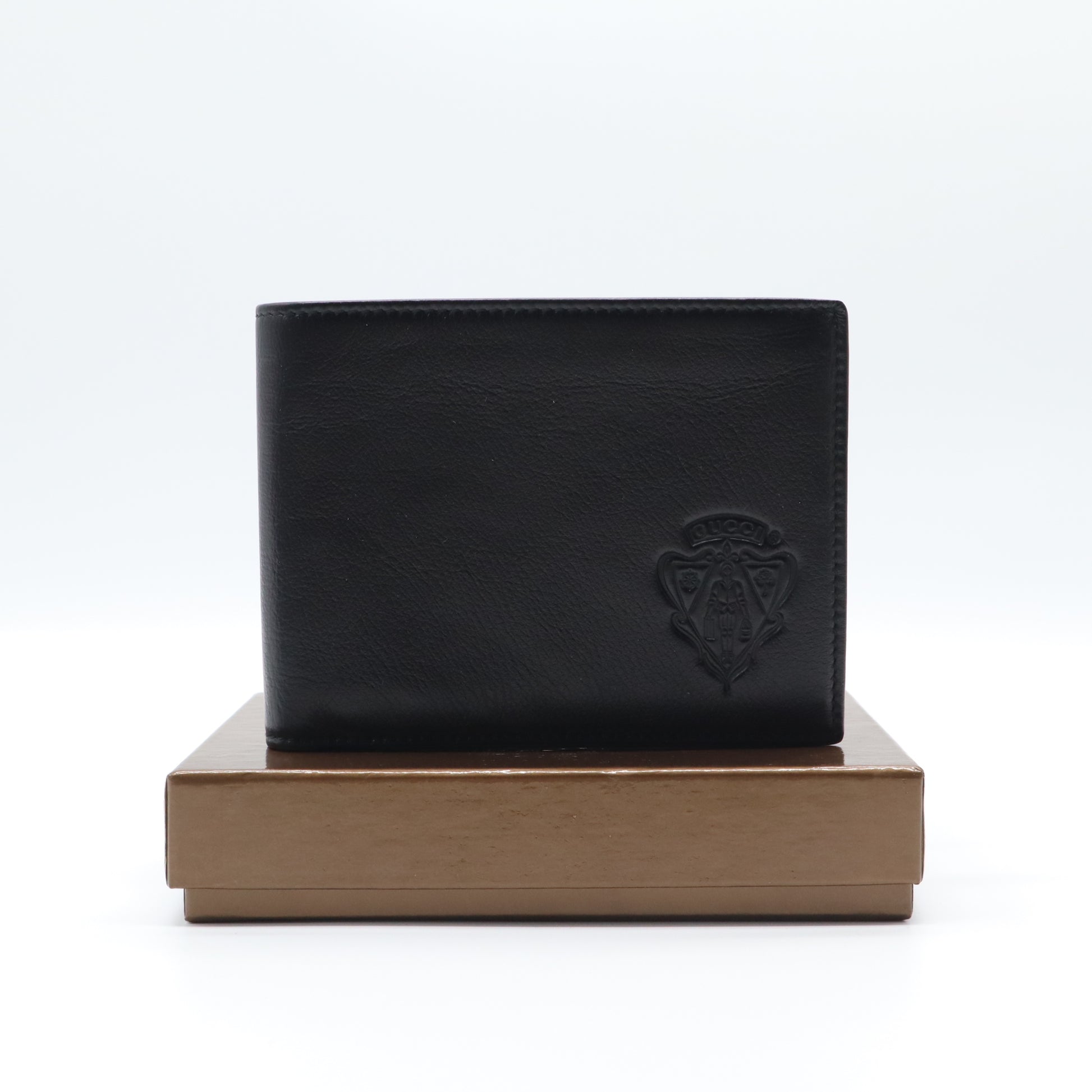 Gucci Crest Embossed Leather Bifold Wallet W21583