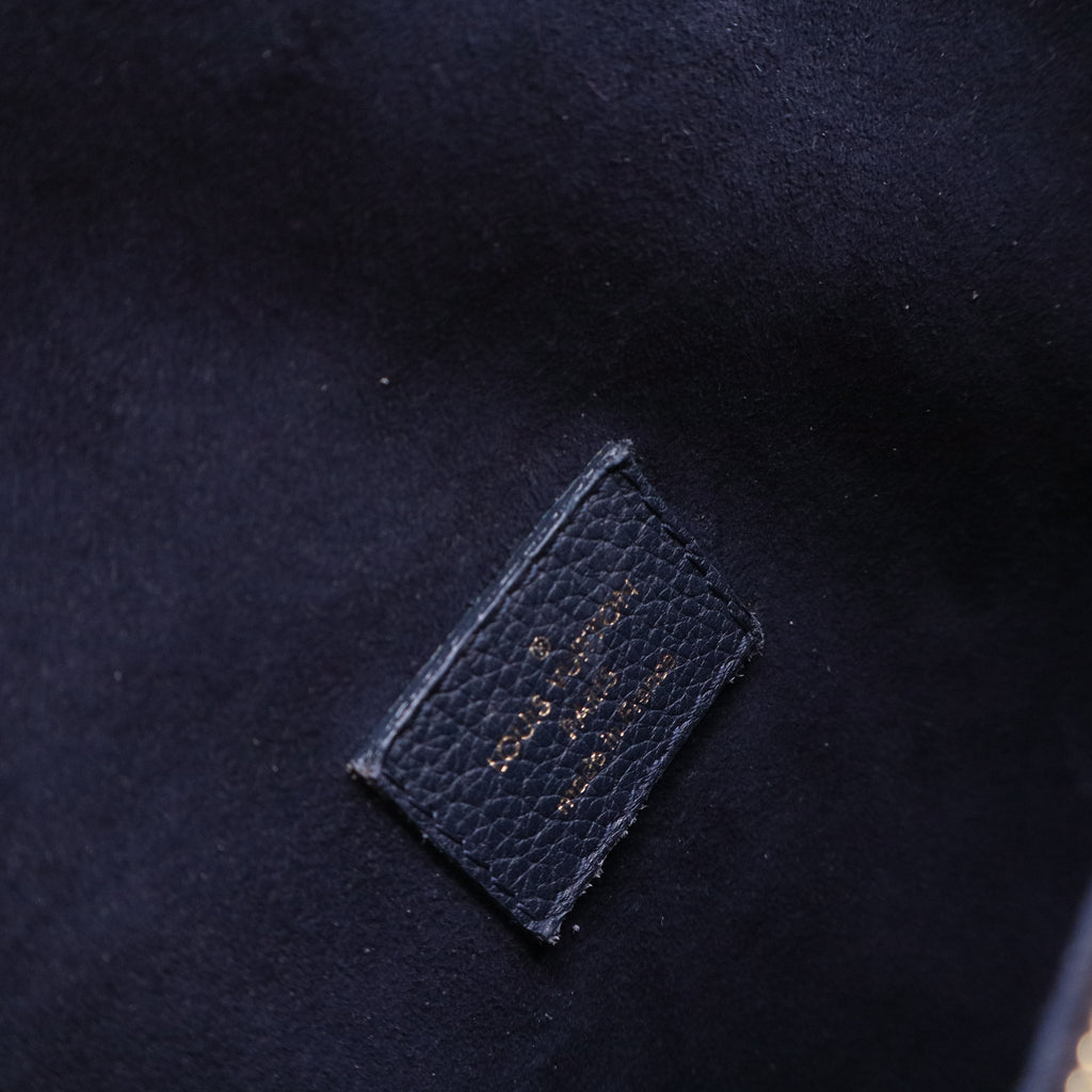 Victoire Handbag Monogram Canvas and Leather