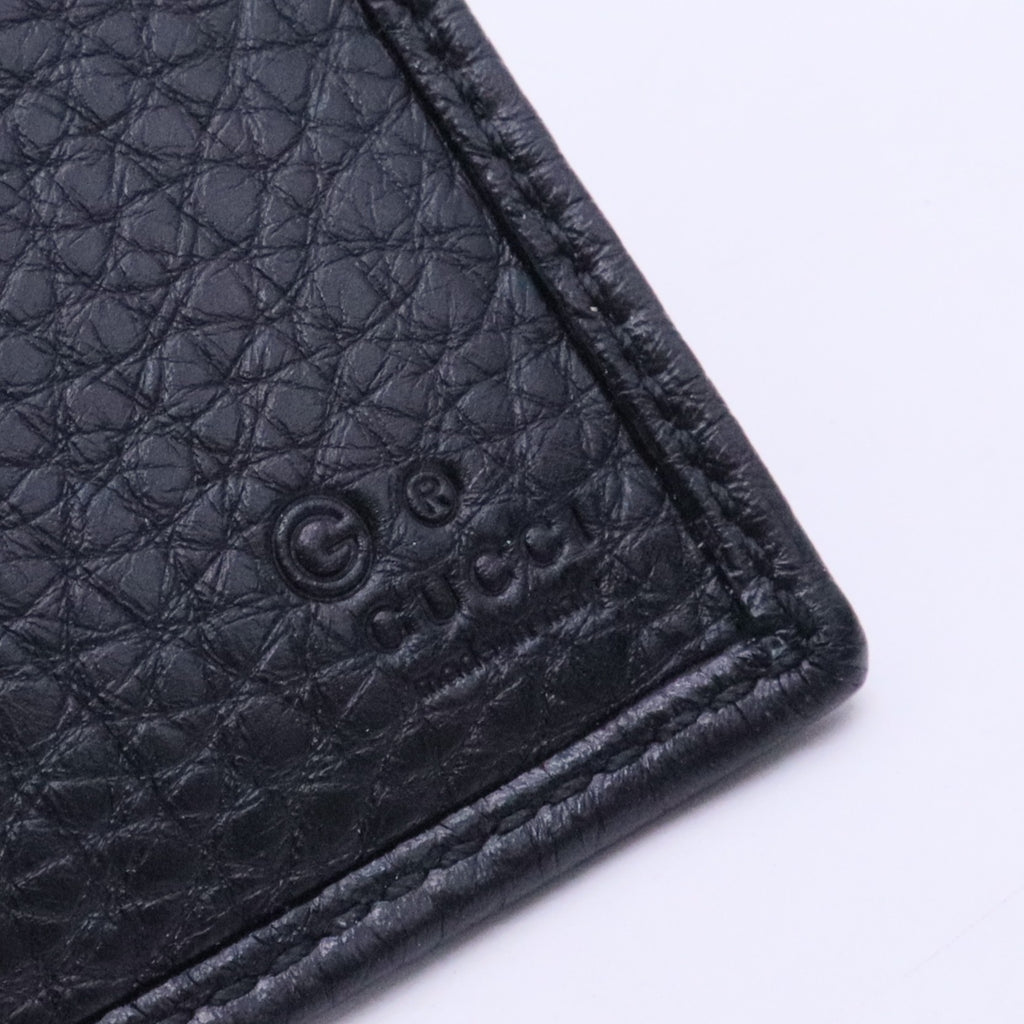 Bi-fold wallet with Gucci logo in black leather