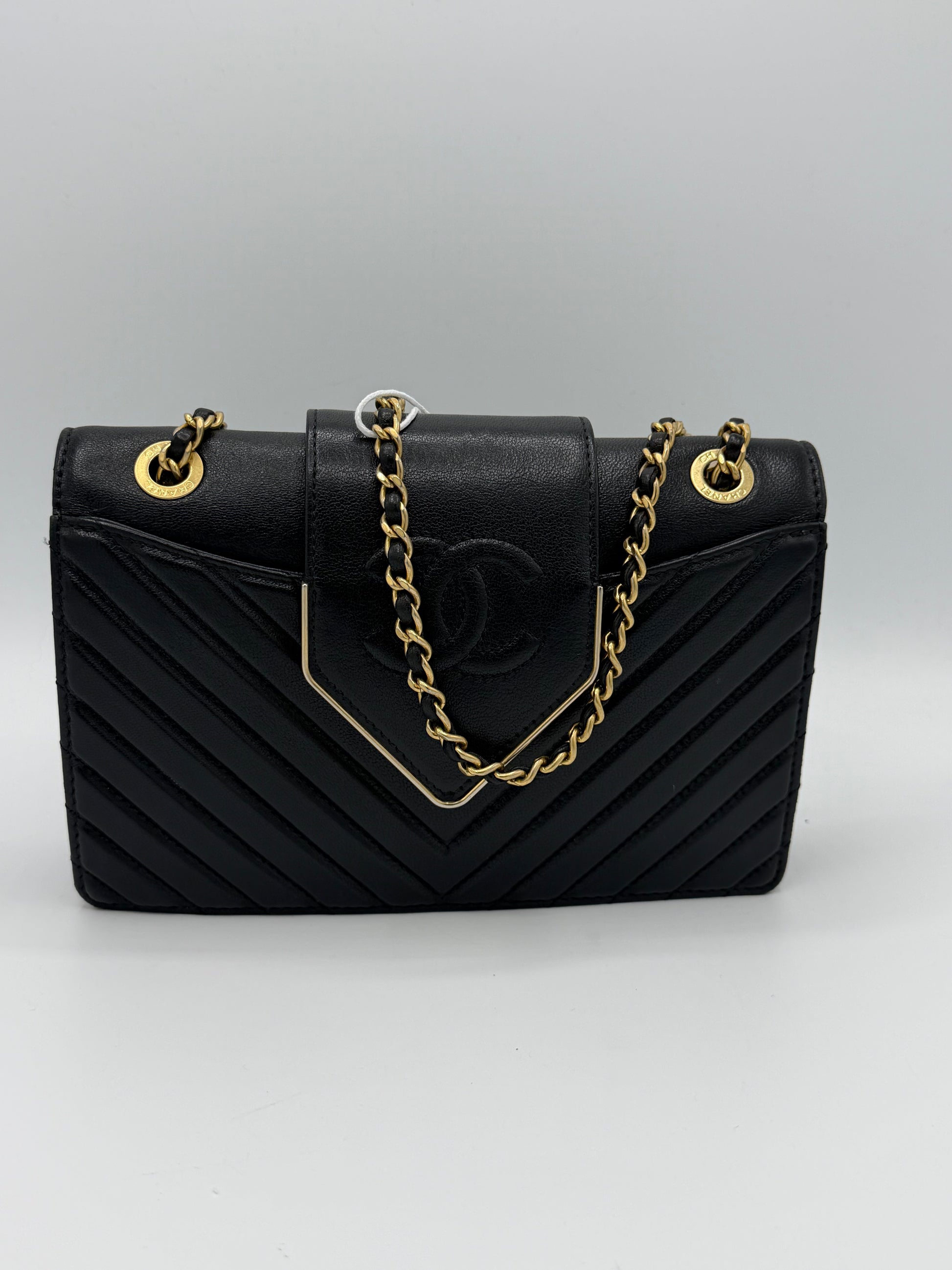 Collar and Tie Flap Bag in black sheepskin leather