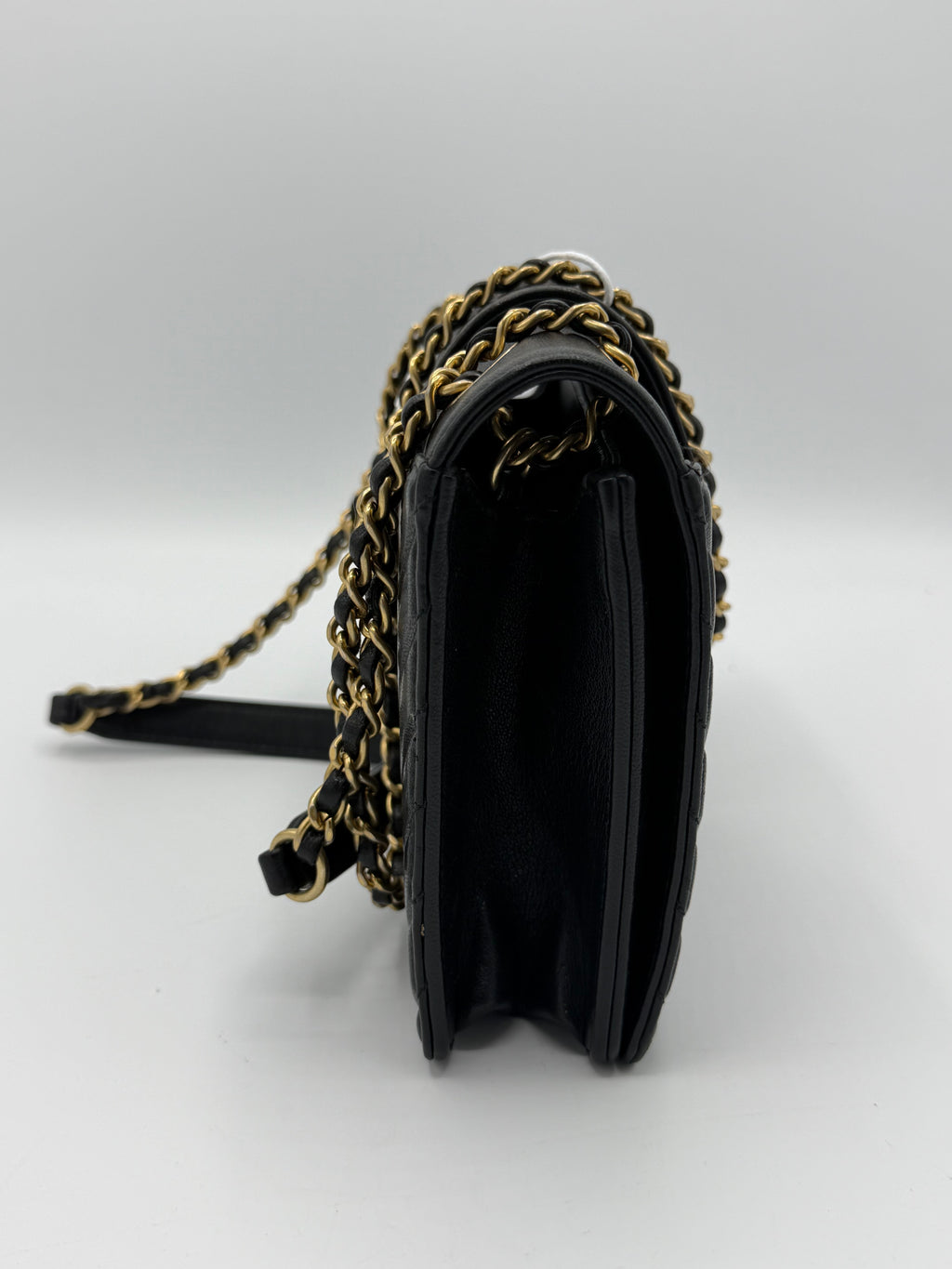 Collar and Tie Flap Bag in black sheepskin leather