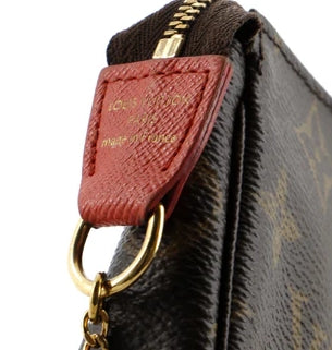 Monogram Mini Pochette Accessoires twins