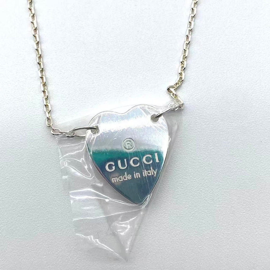 Trademark necklace with heart pendant