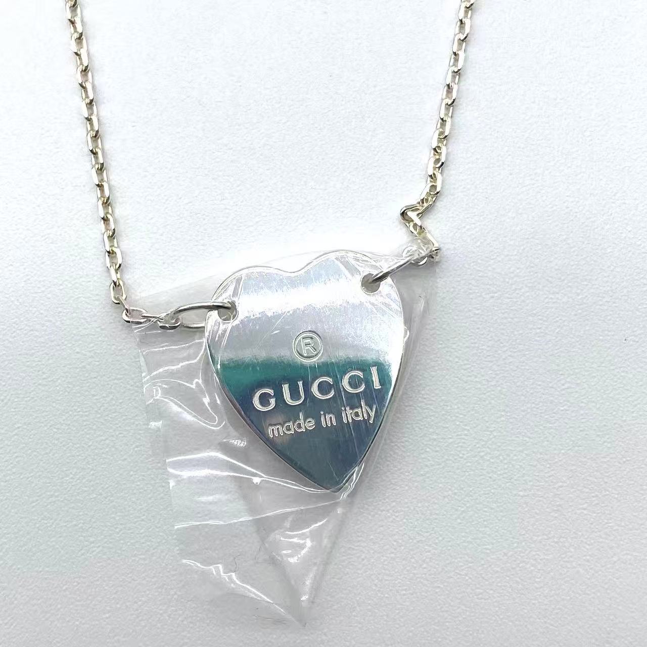 Trademark necklace with heart pendant