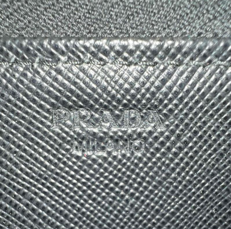 Prada Saffiano Triangle Zip Around Wallet Black W23505