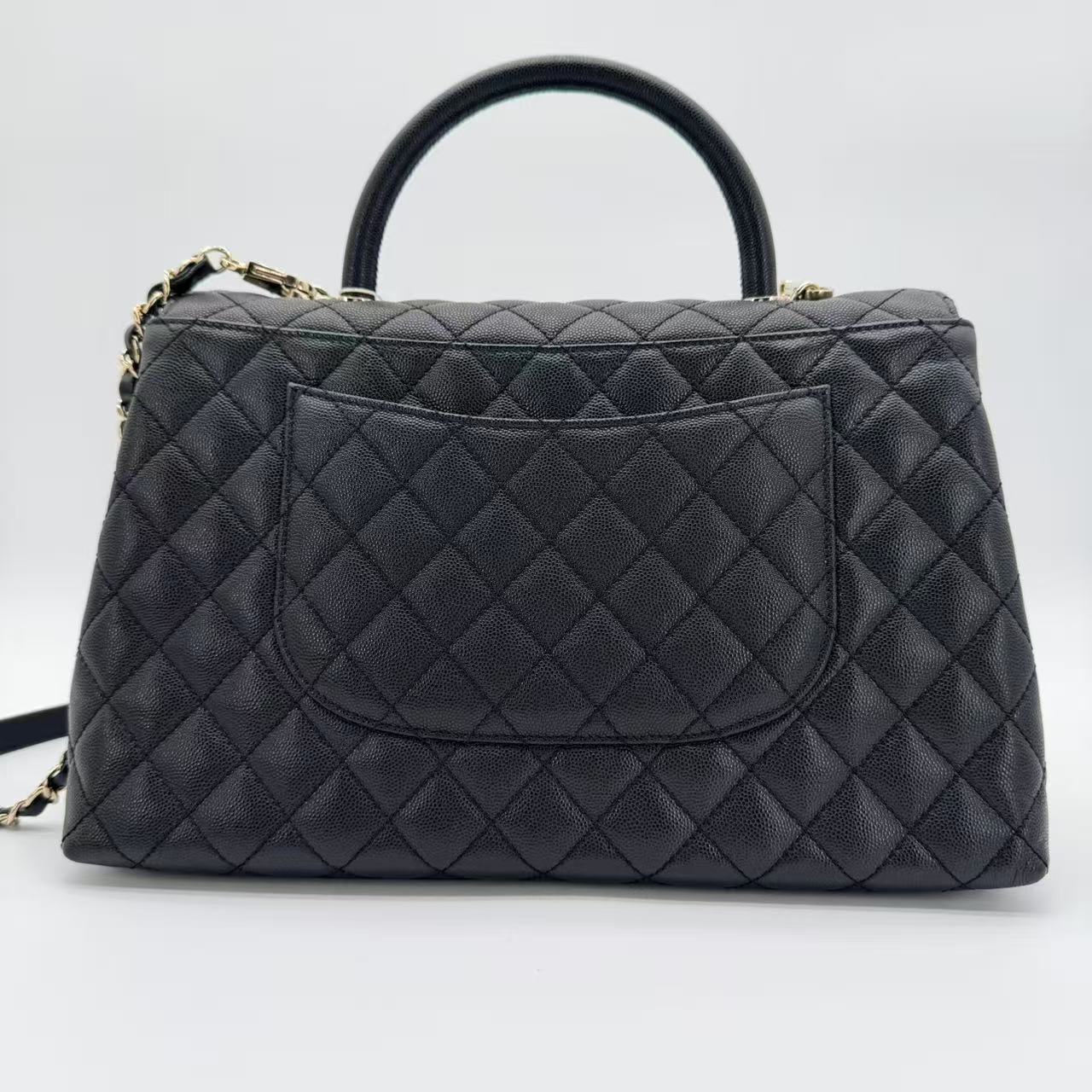 Coco Handle Flap Bag in black caviar leather with gold-tone HW
