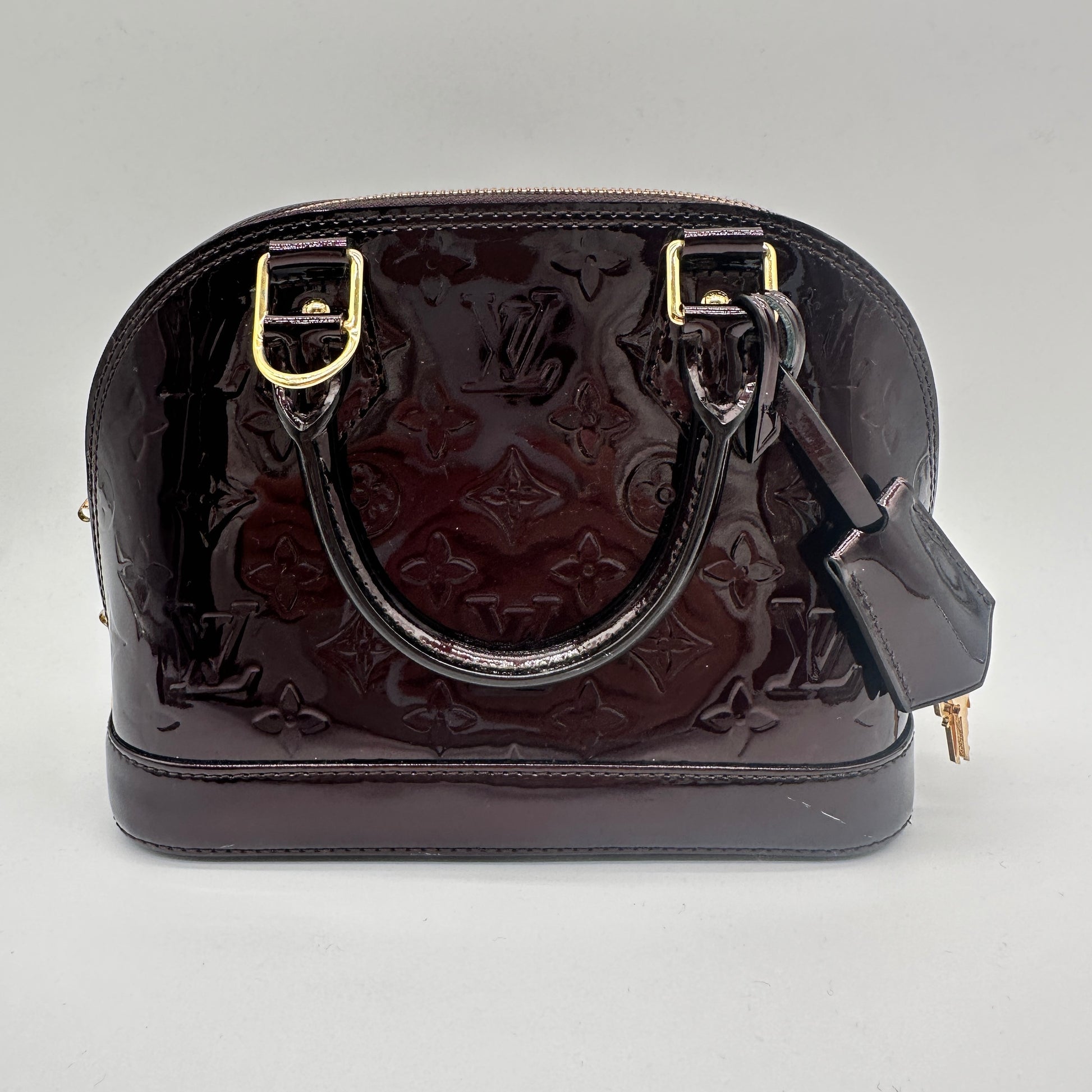 Alma Handbag Monogram Vernis BB