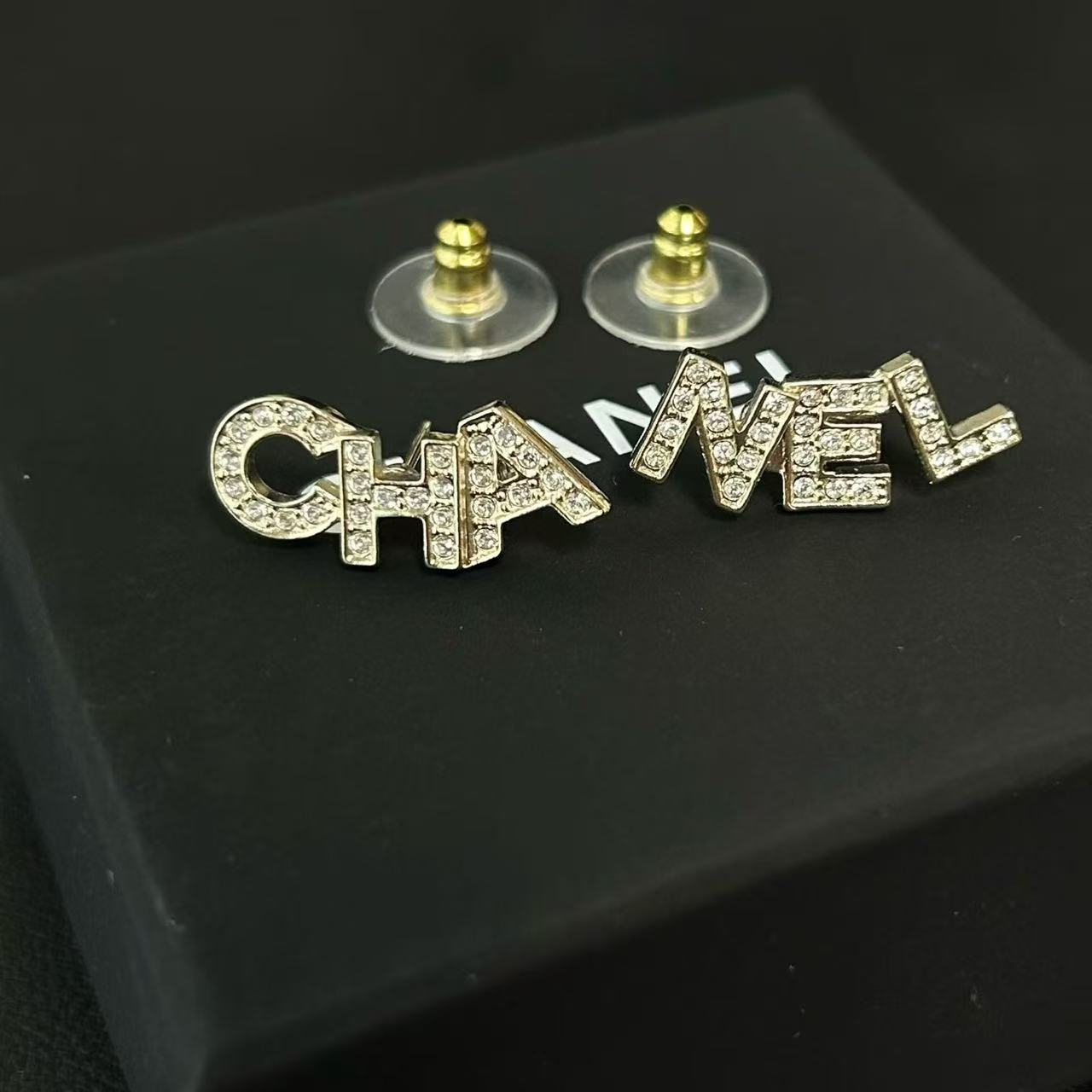 Chanel Signature Stud Earrings Gold Twins LDZ603