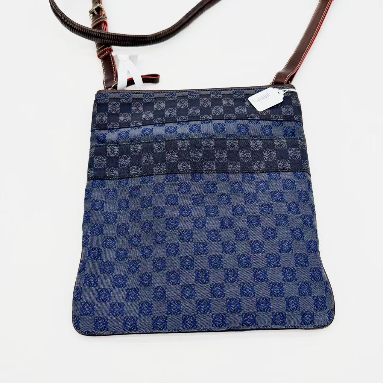 Anagram canvas shoulder bag with leather trim