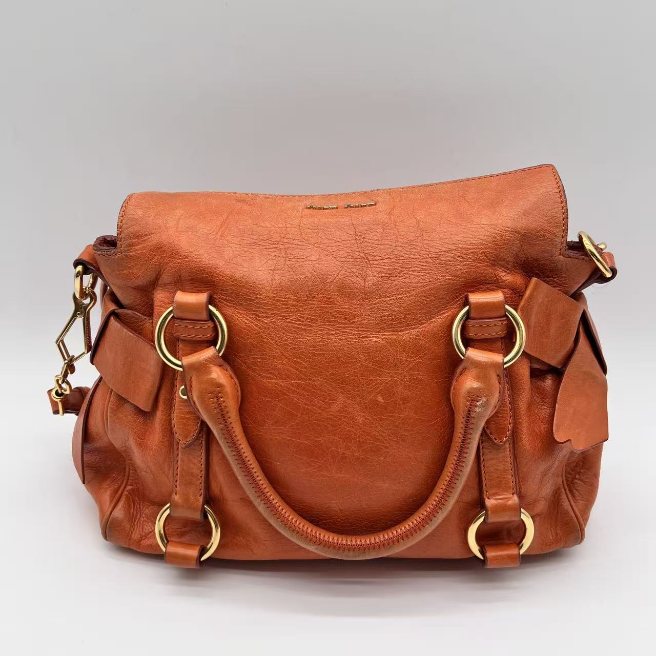 Bow bag leather handbag