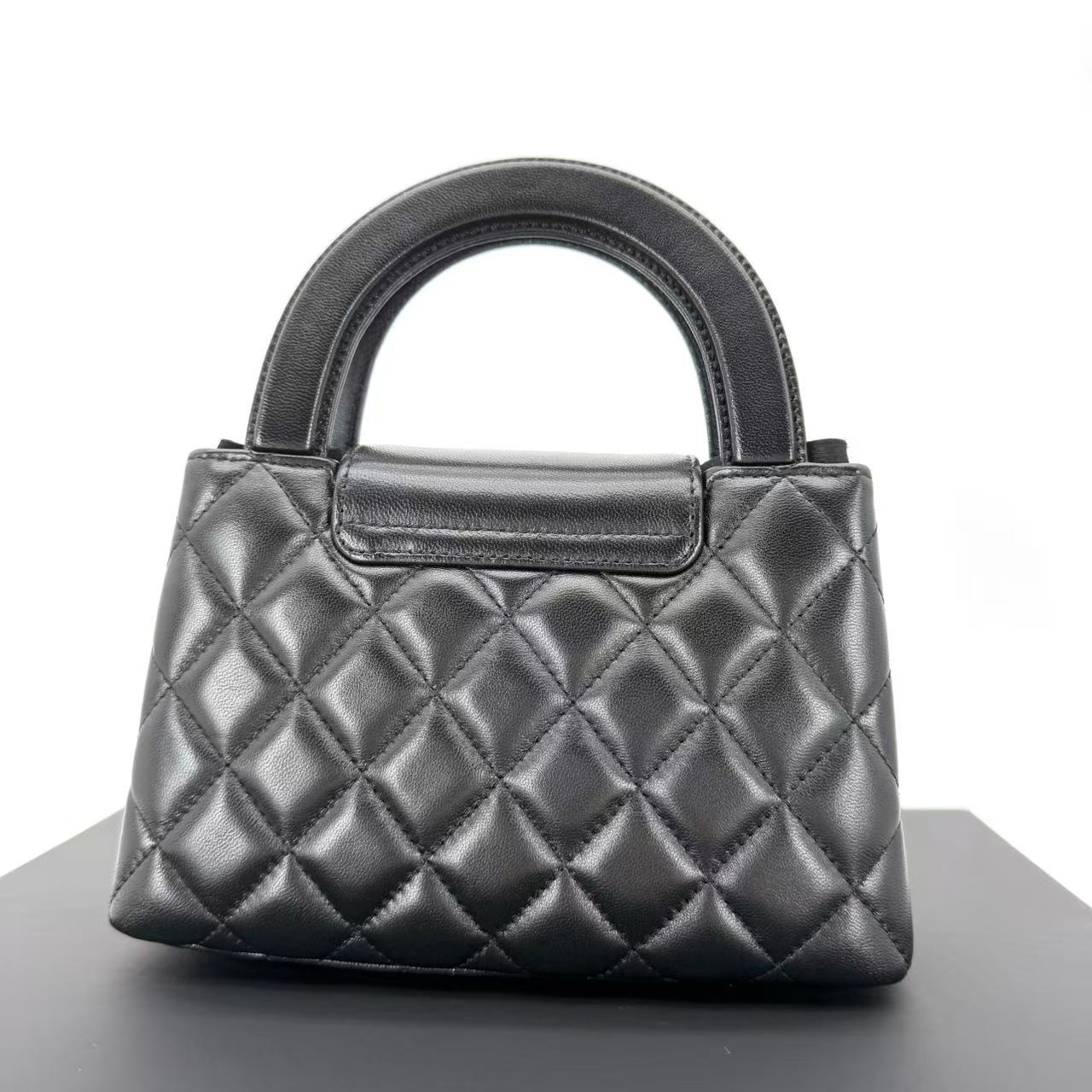 Nano Kelly Shopper bag in black shiny aged calfskin leather with gold hardware