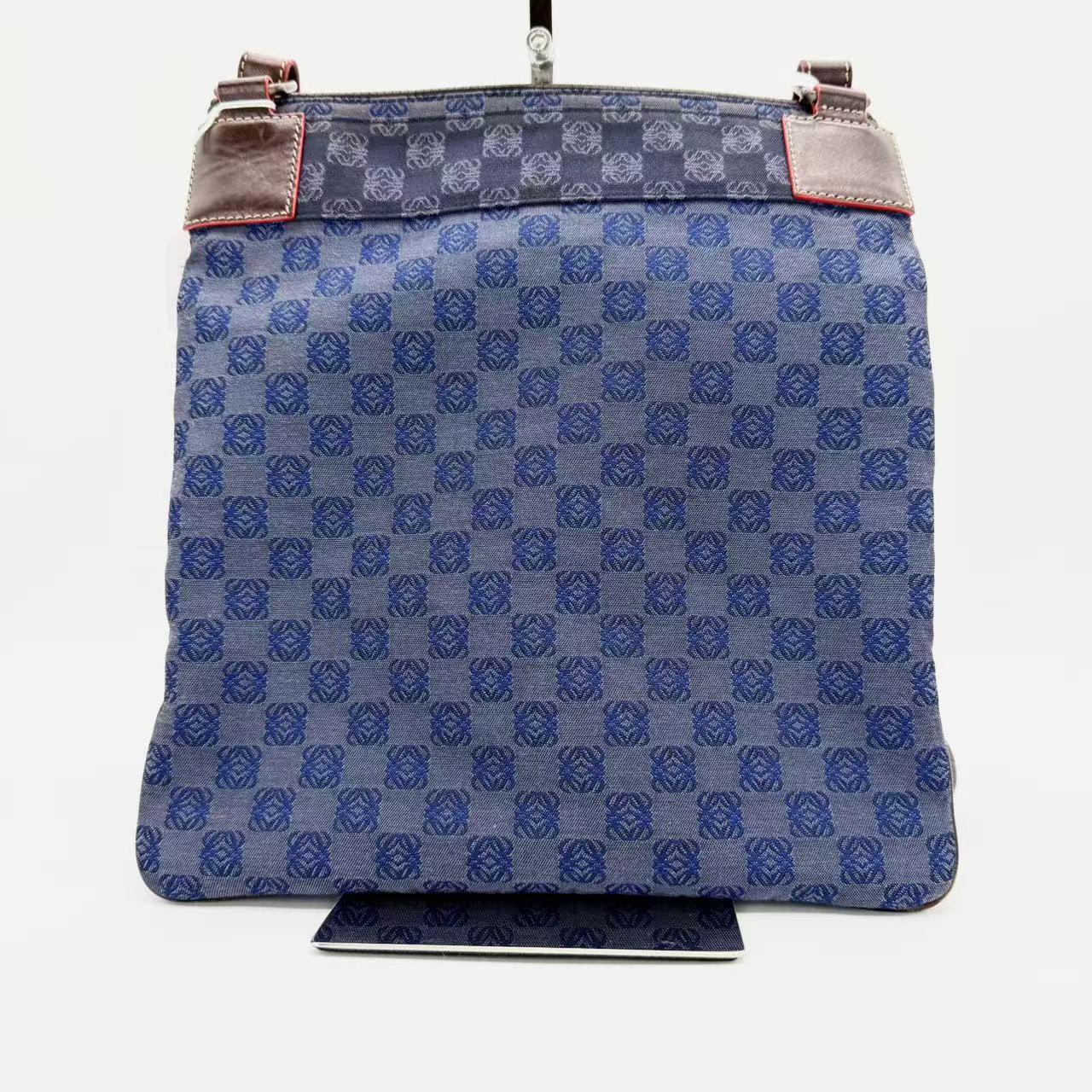Anagram canvas shoulder bag with leather trim
