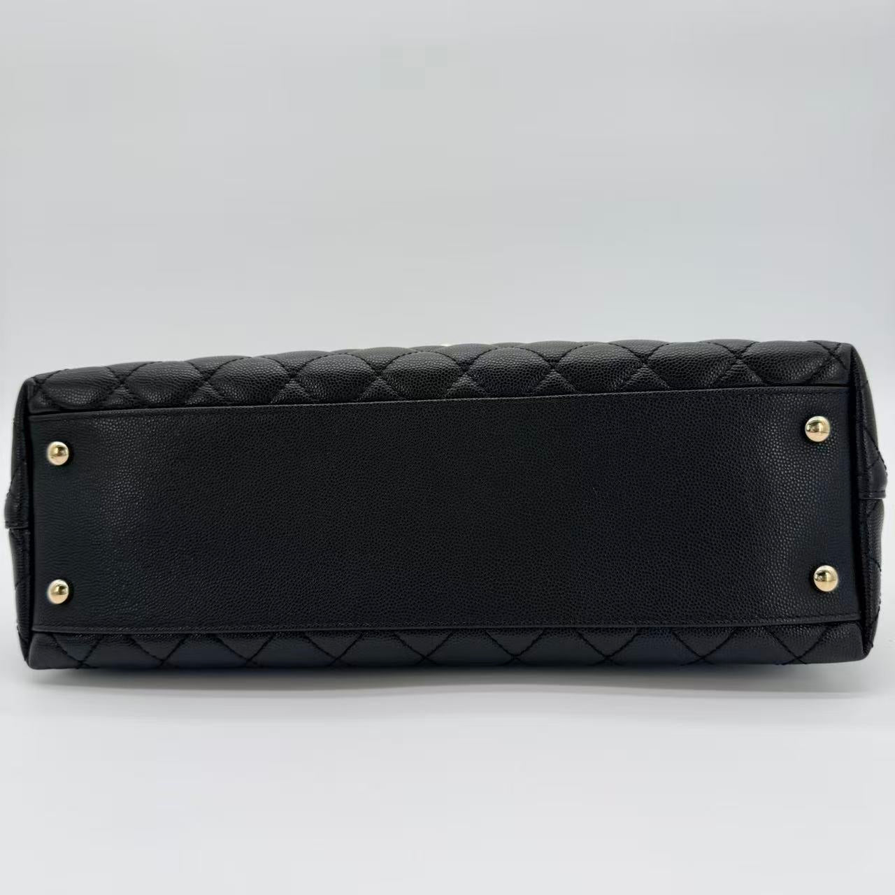 Coco Handle Flap Bag in black caviar leather with gold-tone HW