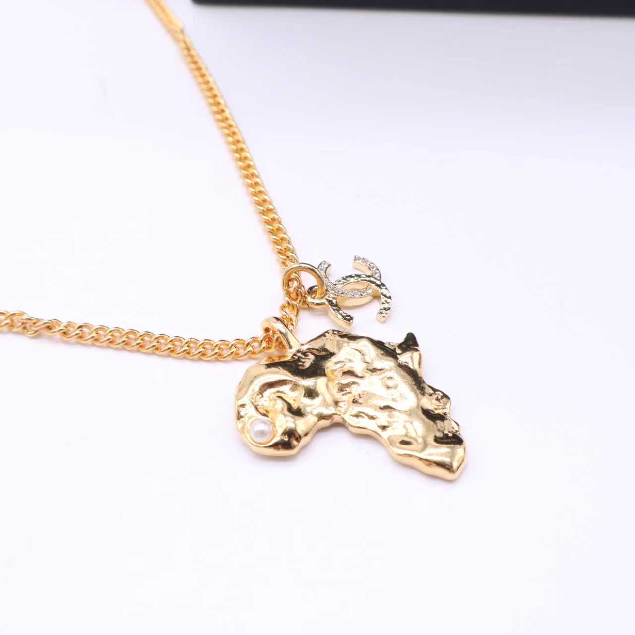 Chanel Africa Pendant Necklace Gold Metal twins LDZ970