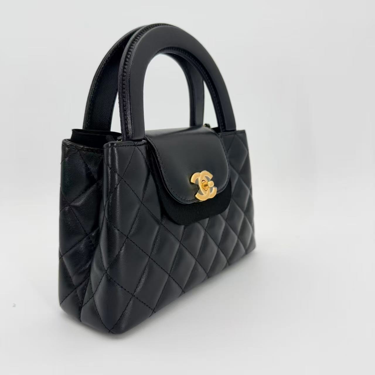 Nano Kelly Shopper bag in black shiny aged calfskin leather with gold hardware