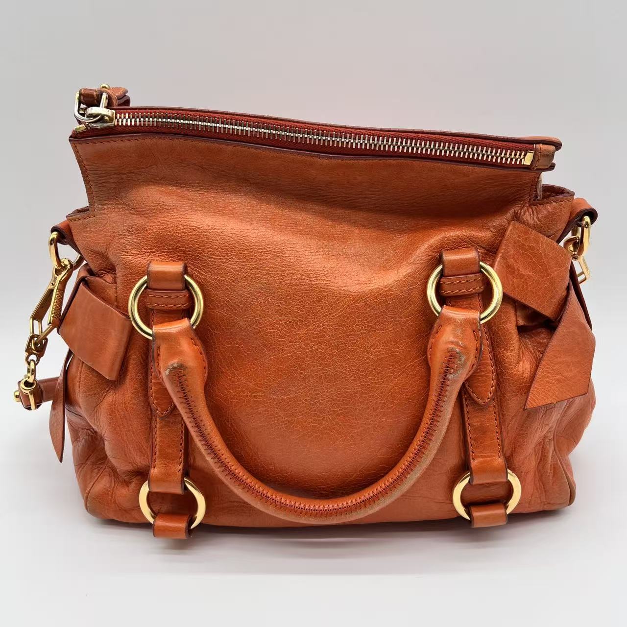 Bow bag leather handbag
