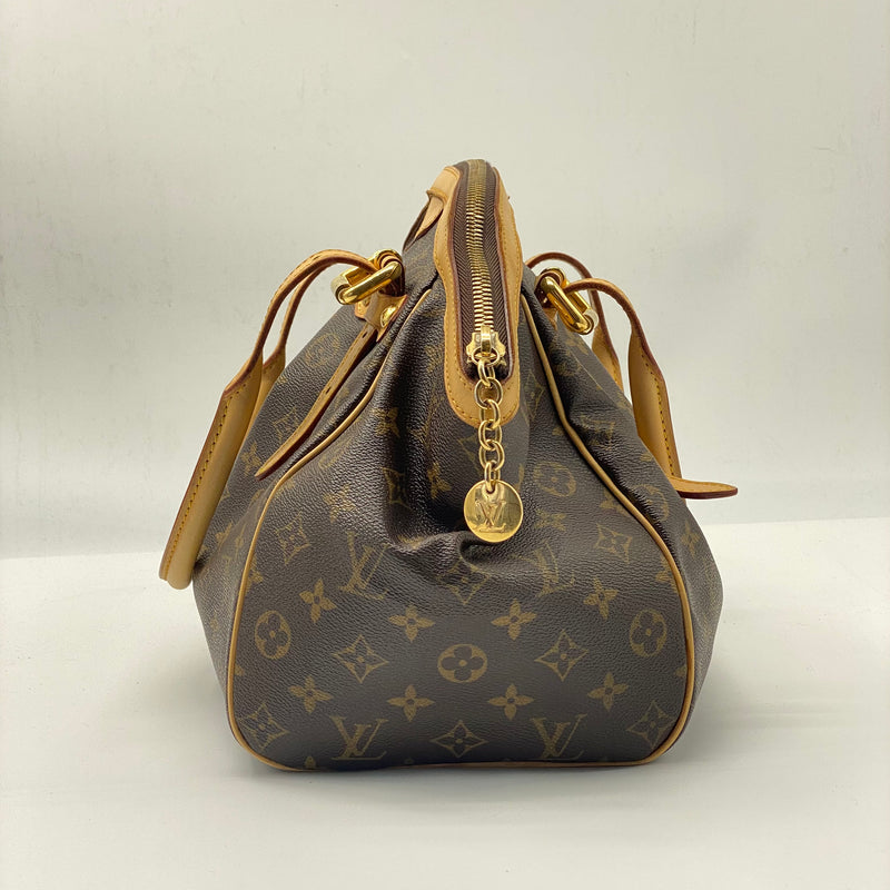 Louis Vuitton Tivoli Leather Handbag