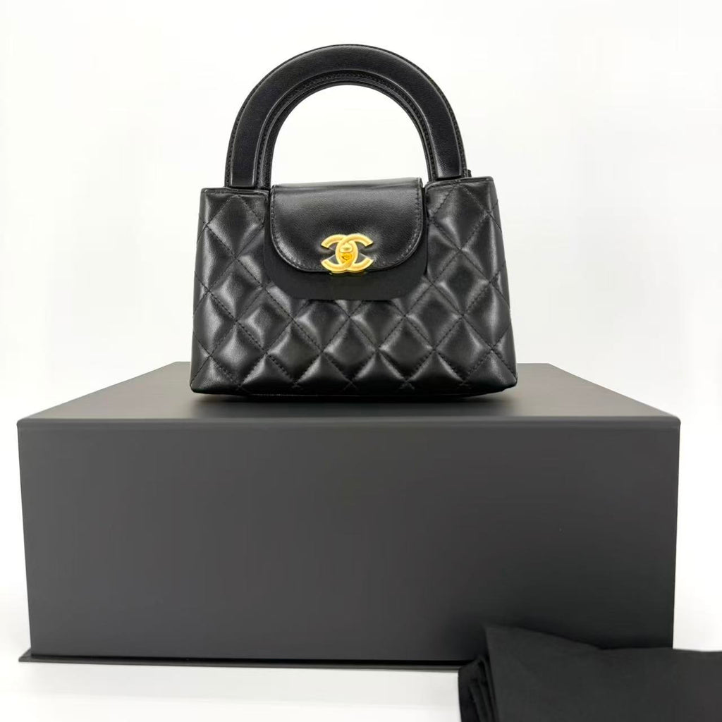 Nano Kelly Shopper bag in black shiny aged calfskin leather with gold hardware