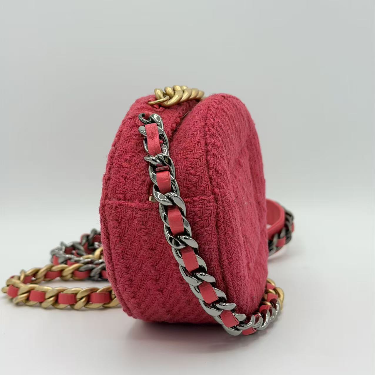 Chanel 19 Round Clutch in pink tweed