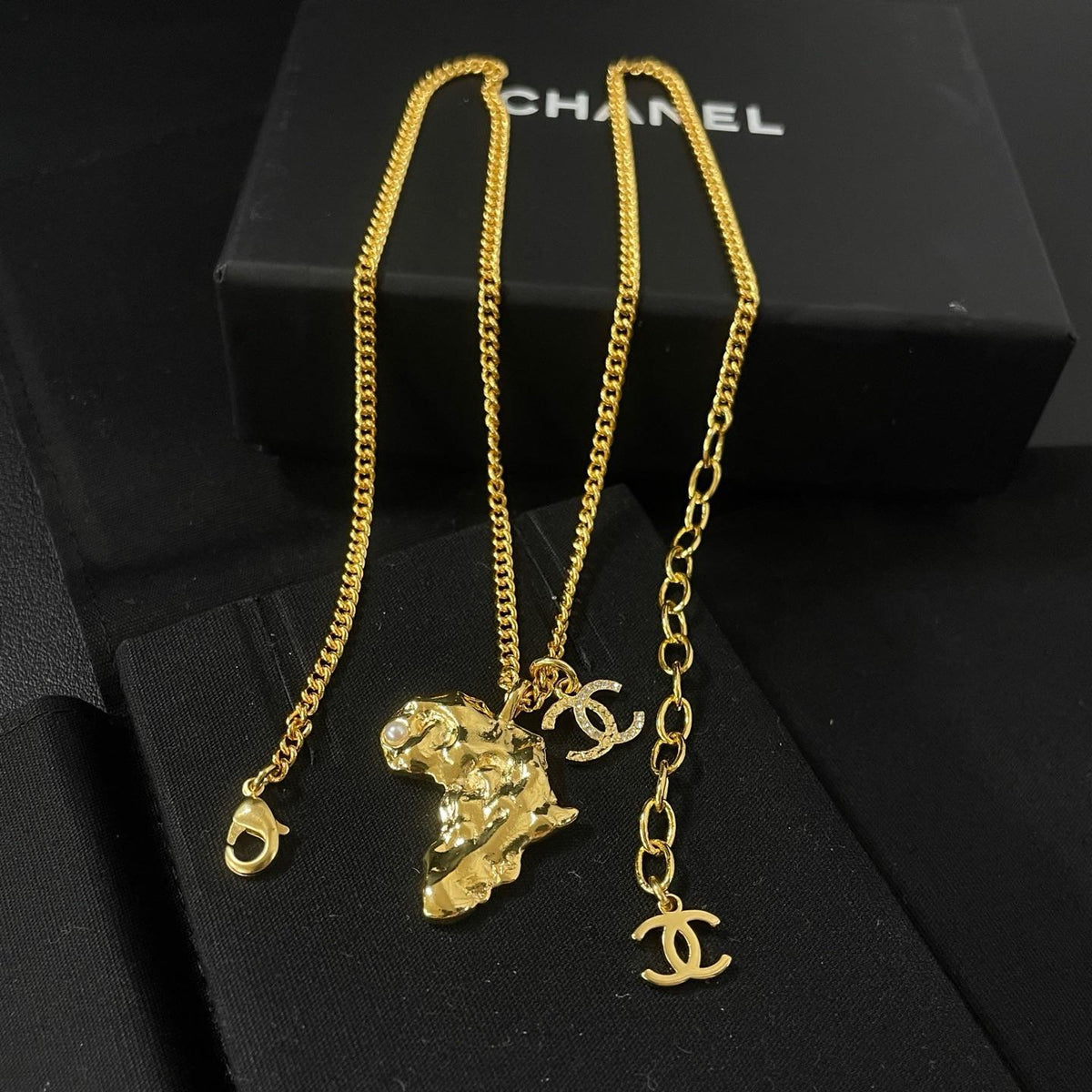 Chanel 2023 Faux Pearl & Strass Africa Map Pendant Necklace Twins LDZ1179