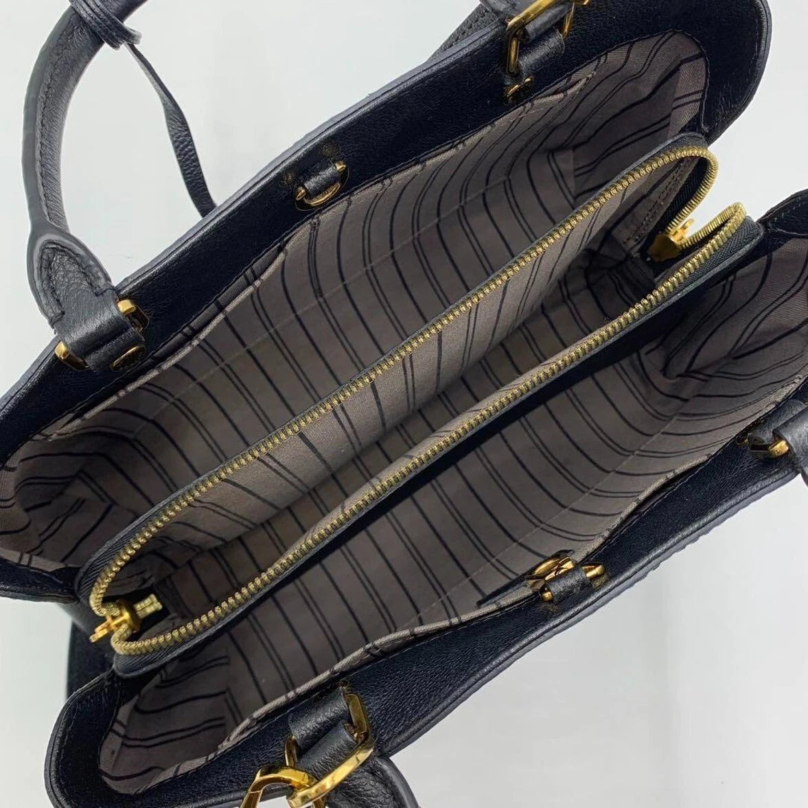 Montaigne Handbag Monogram Empreinte Leather GM twins